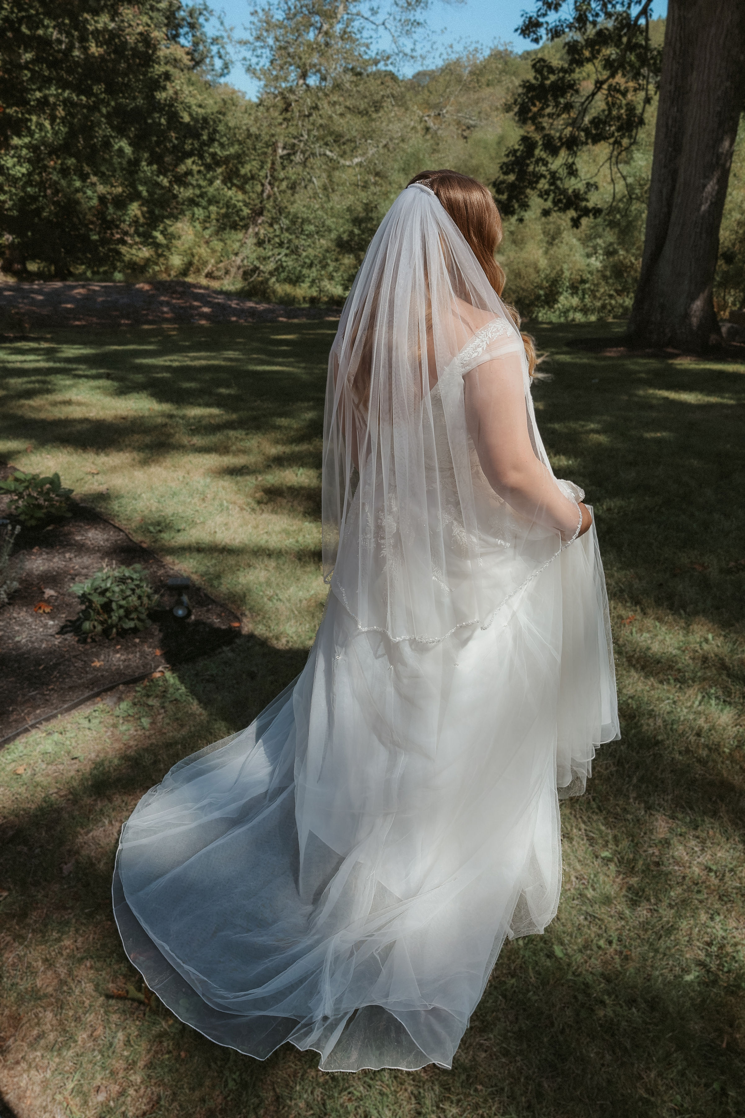 Bride in the gardens at Bell Tower Estate