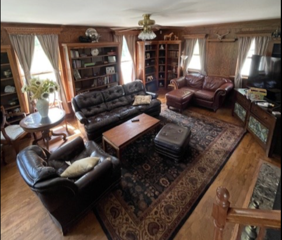 Cozy Living Room with Built-in Bookshelves